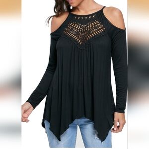 The shirt is a Miholl Women's Crochet Hollow-Out Lace Tunic Top. BLACK  XXL!